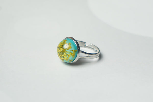 Yellow Real annes with Teal finger ring