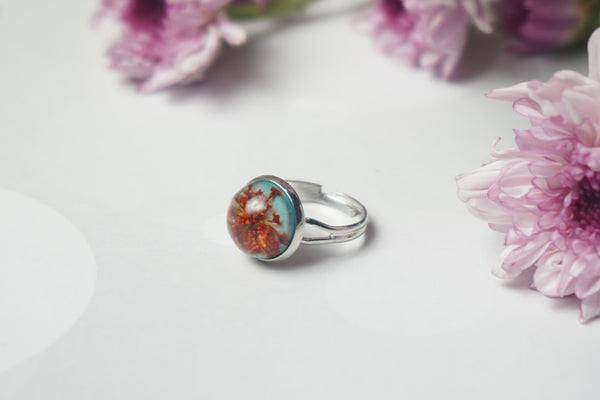 Red Real Annes with Light Blue Finger Ring