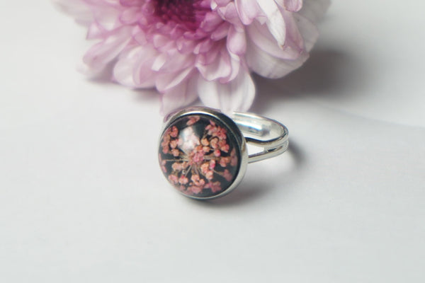 Pink Real annes flower with black finger ring