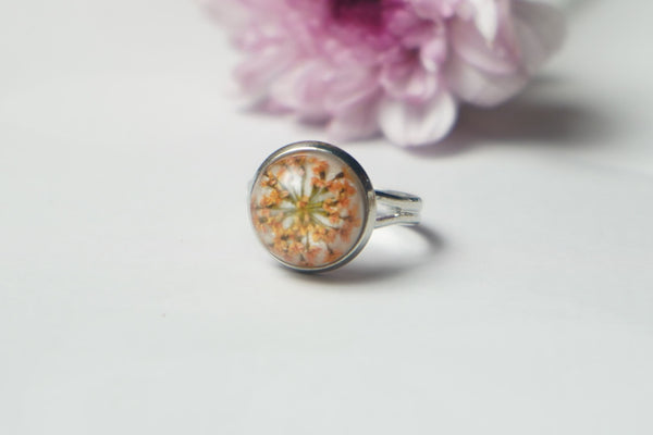 Orange real annes flower with White finger ring